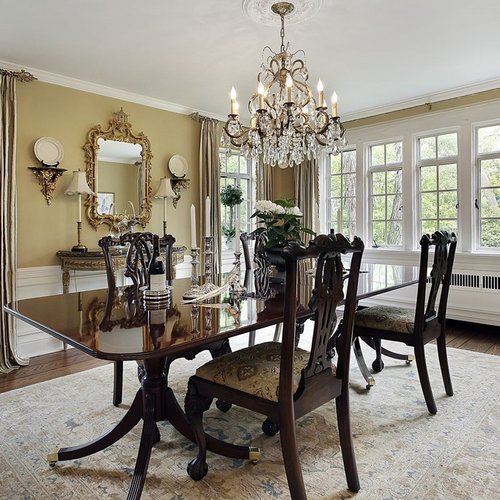 Wood table and chairs on rug